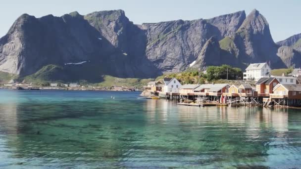 View of the beautiful Norwegian village with red houses on the water — Stock Video