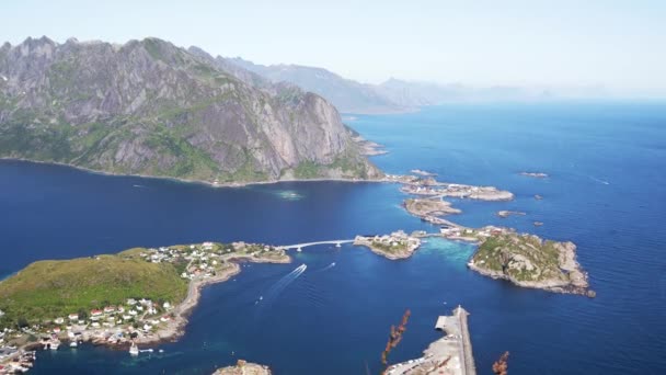 Top view of the beautiful Norwegian village with red houses on the water — Stock Video
