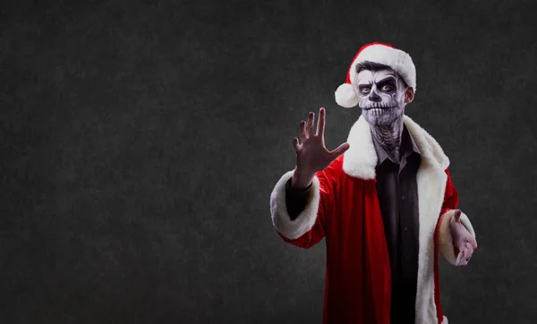 Santa Claus ist ein Zauberer mit Totenkopf an Weihnachten. — Stockfoto