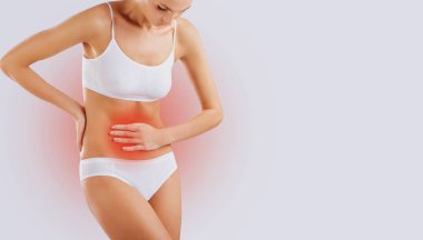 Bir kadının karın ağrısı kavramı. 