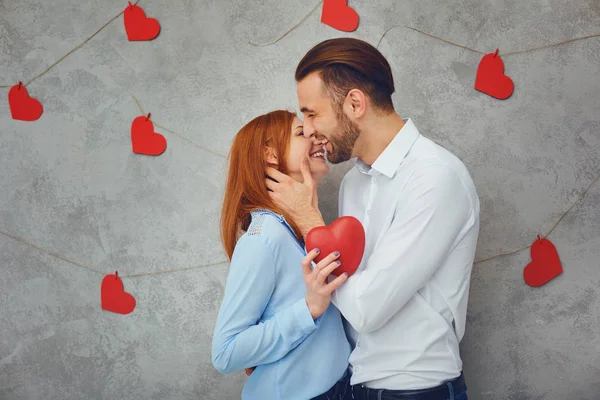 A loving couple with hearts . Valentines Day. — Stock Photo, Image