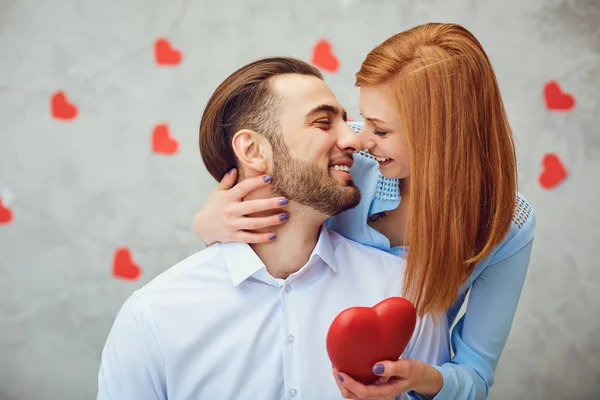 Happy couple with red heart. Valentines day. — Stock Photo, Image