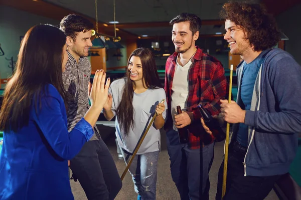 Group of friends laughing in the billiard club. — Stock Photo, Image