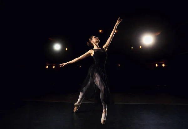 Woman ballet dancer on black background. — Stock Photo, Image