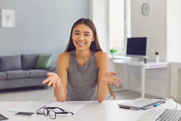 Smiling modern female life coach or vlogger sharing experience in online video meeting — Stock Photo, Image