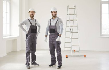 Repair team, restoring workers on construction project, building architectural plan, real estate object for renovation, property reconstruction, recreating, renewing room professional portrait