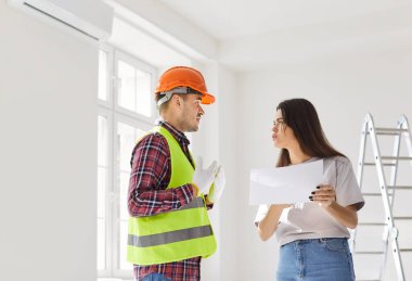 Displeased client and worker argue while discussing a blueprint and renovation project estimate for a home. The disagreement highlights conflict over planning and construction details.