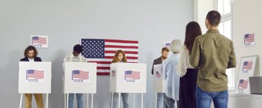 Group of diverse american citizens people registering at polling station on election day and putting their ballots in bin in voting booth. Voters standing in queue at vote center. Banner.