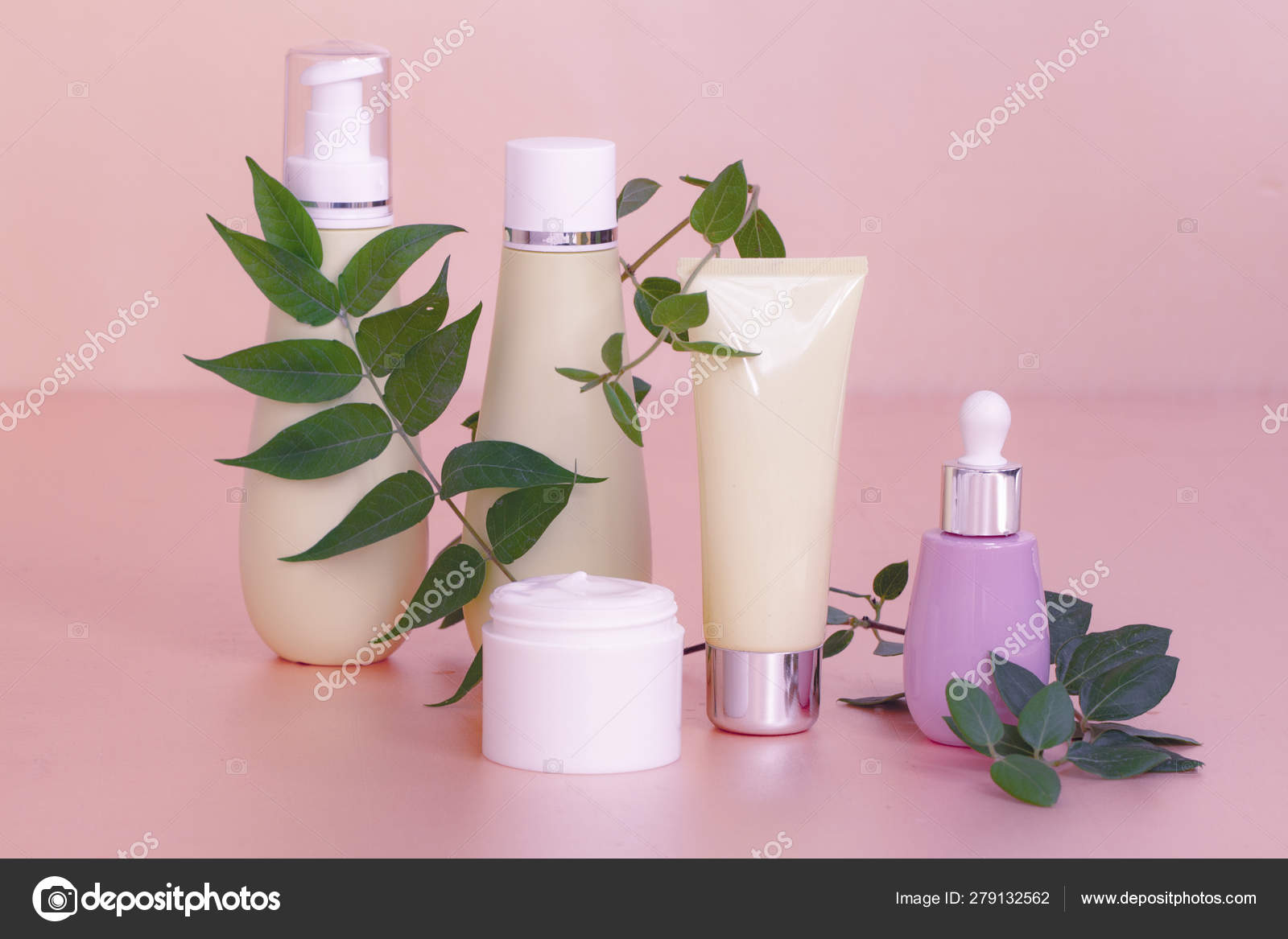 Premium Photo  Pink cosmetic containers. skin care cosmetic bottles on  floral background