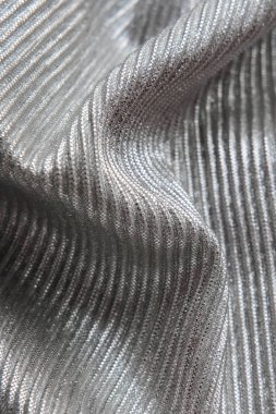 Kabarık parlak kumaş, Pileli. Gümüş malzeme Tekstil.