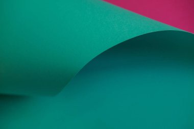 Soyutlama tasarım yeşil ve pembe kağıt. Tek renkli kağıt üzerinde boş alanı. 