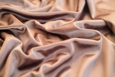 Kumaş altın dalgalar - arka plan ve doku için malzeme. Yakın u