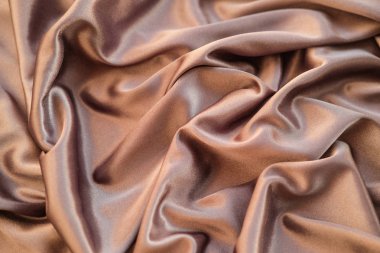 Kumaş altın dalgalar - arka plan ve doku için malzeme. Yakın u