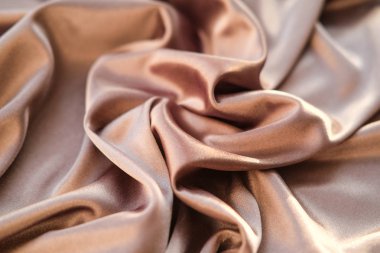 Kumaş altın dalgalar - arka plan ve doku için malzeme. Yakın u