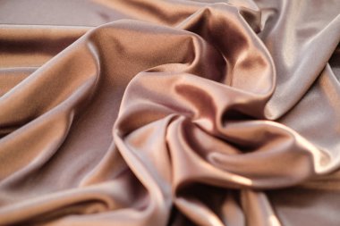 Kumaş altın dalgalar - arka plan ve doku için malzeme. Yakın u