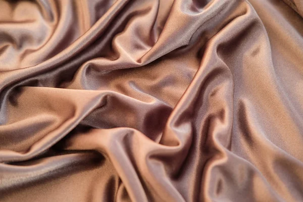 Kumaş altın dalgalar - arka plan ve doku için malzeme. Yakın u