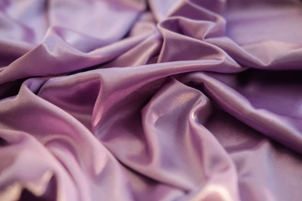 Bliska różowa tkanina. Purpurowe tkaniny jest określone fale. Fuchs — Zdjęcie stockowe