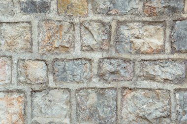 Arkaplan veya doku için büyük taş bir duvarın parçası