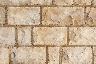 Arkaplan veya doku için büyük taş bir duvarın parçası