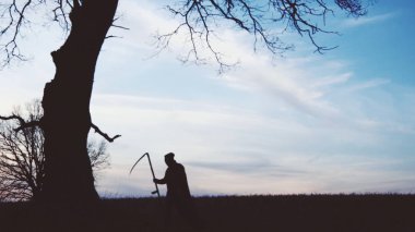 yumuşak odak. Azrail günbatımı siluet. ölüm kavramı.