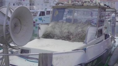 bir kaç eski balıkçı üç drift ağları ile pier Park. Venedik
