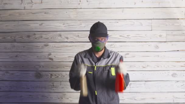 Portrait of a man with spray ready to cleaning something — Stock Video