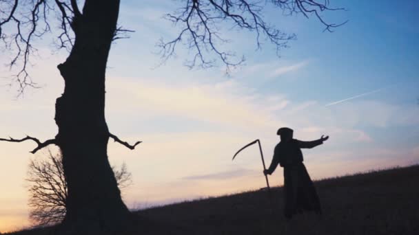 Grim Reaper sunset silhouette. concept of death. Soft focus — Stock Video