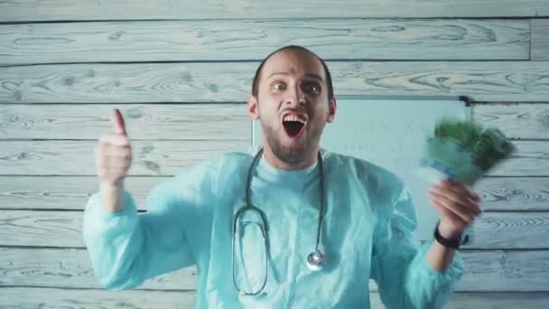 Portrait Of Happy Male Doctor Holding euro Bank Notes — Stock Video