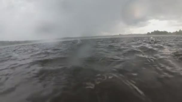 Heavy Rain Drops Falling On The Lake Water Surface. Slow motion — Stock Video