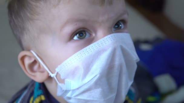 Close-up of a boy with mask. Infected sick child. — Stock Video