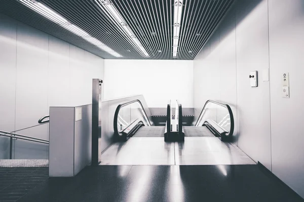 Modern escalator moving downstairs — Stock Photo, Image