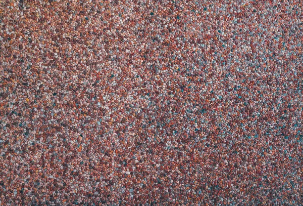 Texture of a pebble facade — Stock Photo, Image