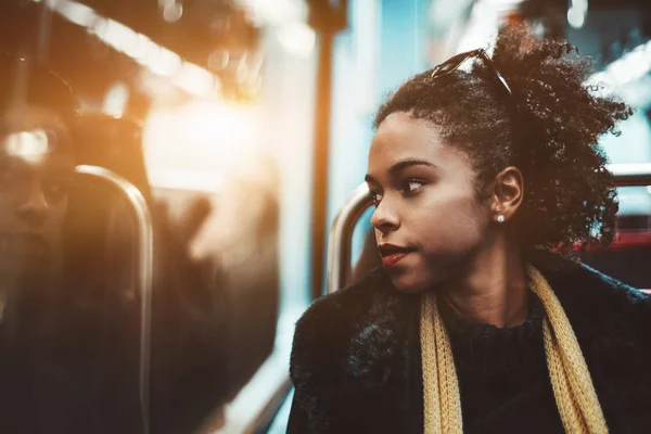 Biracial chica en un metro tren —  Fotos de Stock