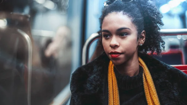 Mujer Biracial en un vagón de metro —  Fotos de Stock