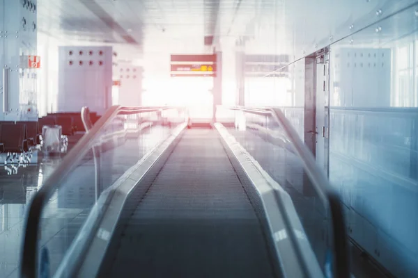 An indoor travelator with a flare — Stock Photo, Image