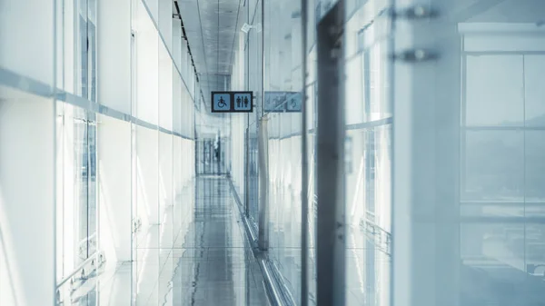 A long modern glass hall — Stock Photo, Image