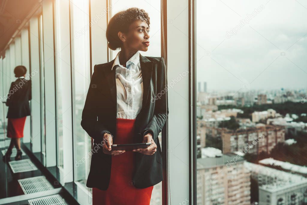 A businesswoman with digital tablet