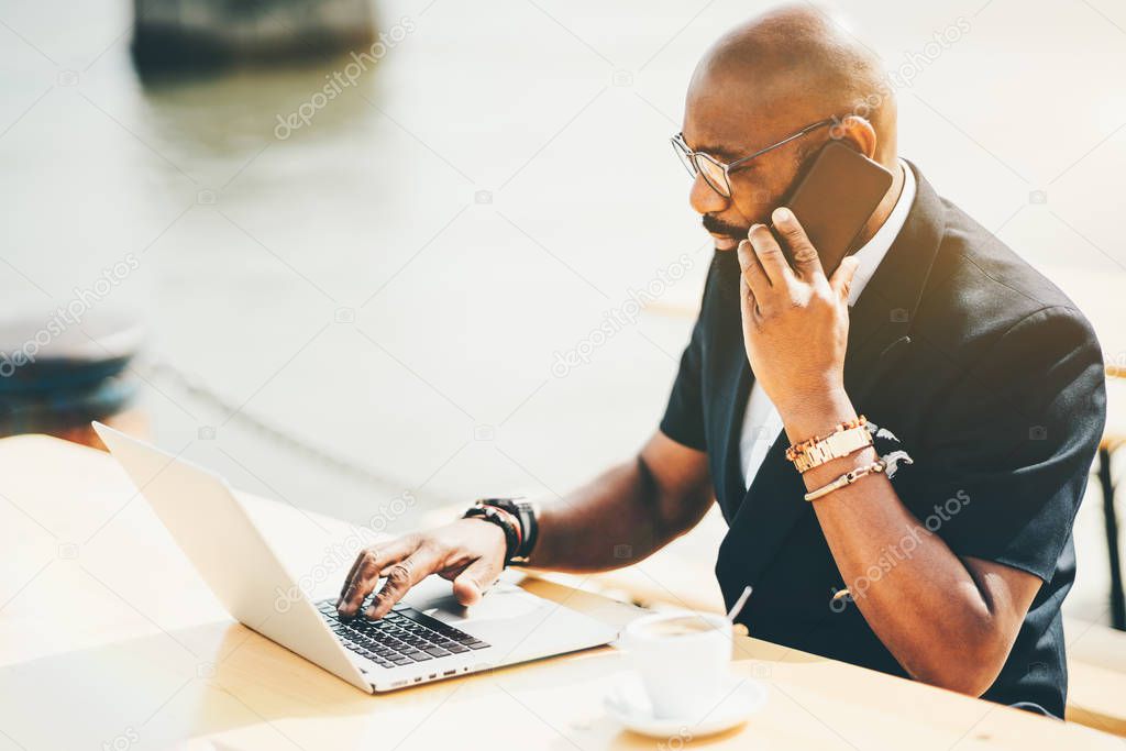 African businessman with a netbook
