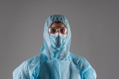 Coronavirus, koruyucu kıyafetli doktor.