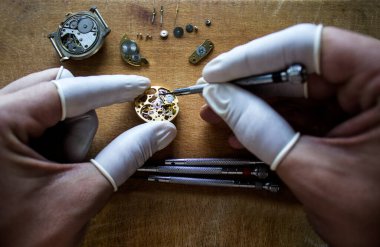 Mechanical watch repair, watchmaker's workshop clipart