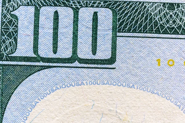 Bir banknotun bir parçası 100 Amerikan doları.