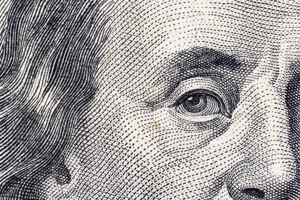 Bir banknotun bir parçası 100 Amerikan doları.