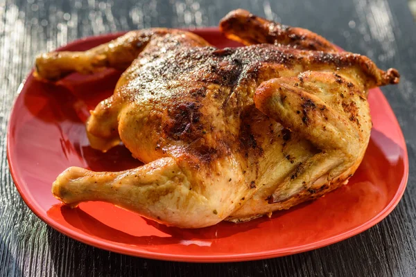 stock image chicken tobacco on a red plate