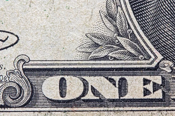 Bir Amerikan doları banknotunun bir parçası. Fotoğraflı yakın plan..