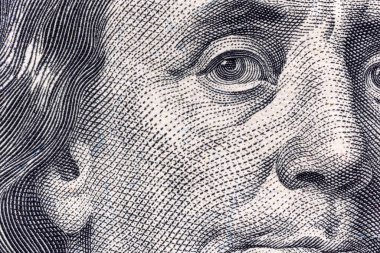 Bir banknotun bir parçası 100 Amerikan doları.