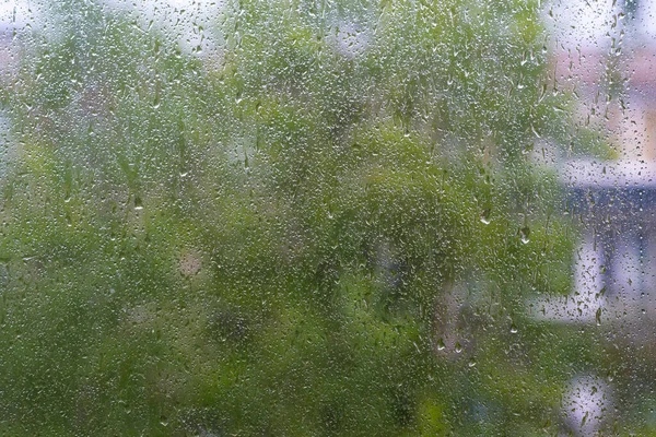 Drops on the glass during heavy rain.