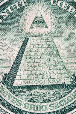 Bir Amerikan doları banknotunun bir parçası. Fotoğraflı yakın plan..