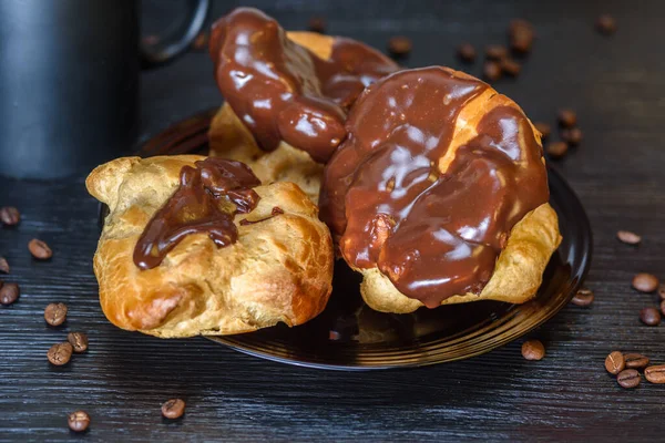 Coffee Chocolate Eclairs Wooden Background — Stock Photo, Image