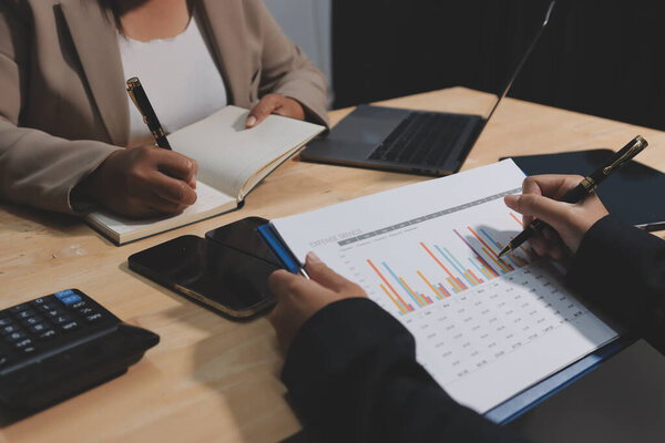 Accounting company provide finance and taxation planning for profitable cash flow, Auditor and accountant team working in office, analyze financial data and accounting record with calculator.Insight