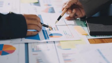 business team discussing and analyzing data